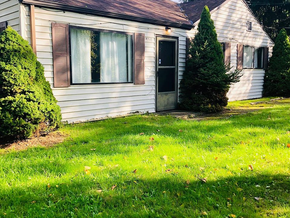 Front Door to house and a nice big front yard