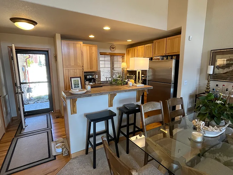 Open kitchen with stainless steel appliances