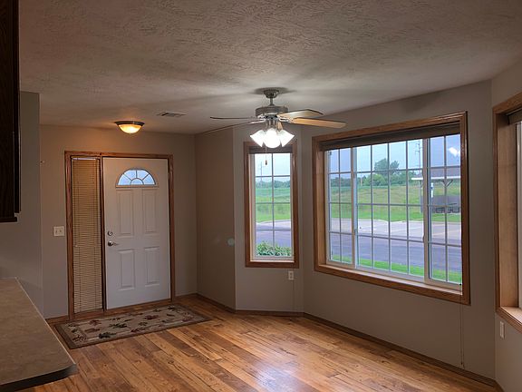 Entry door and dining area