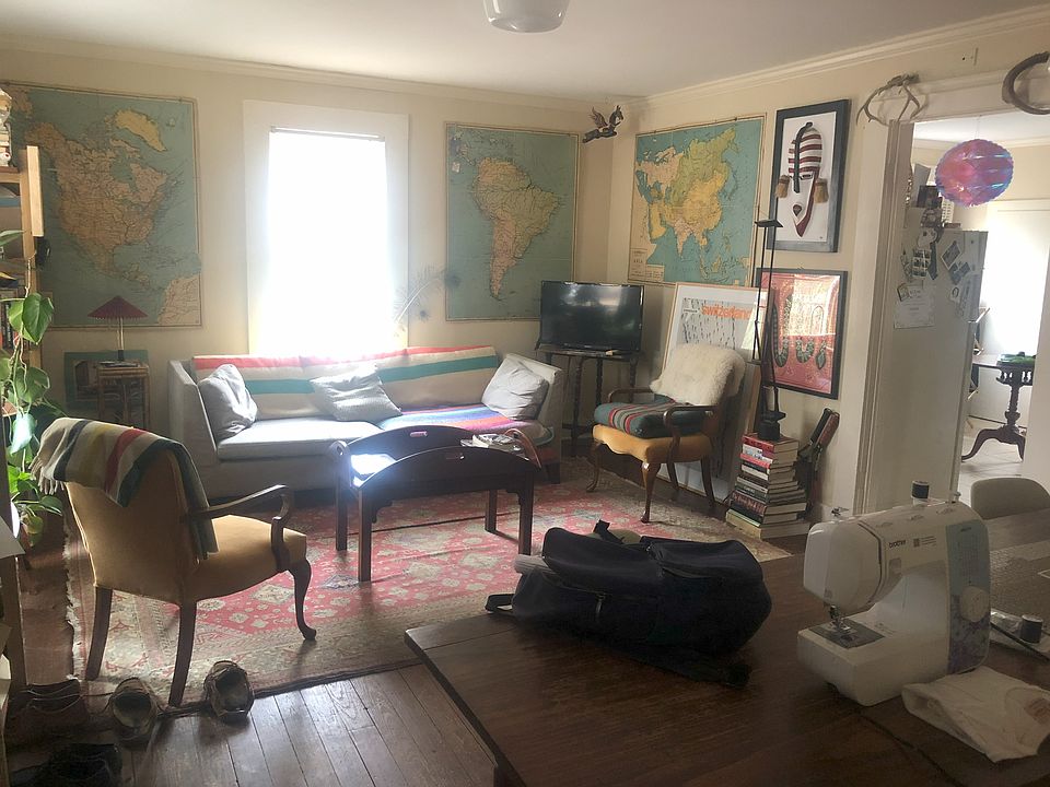 Large living room with lots of natural light.