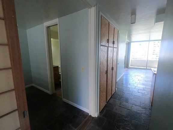 As you step inside, bedroom one is just to your left.