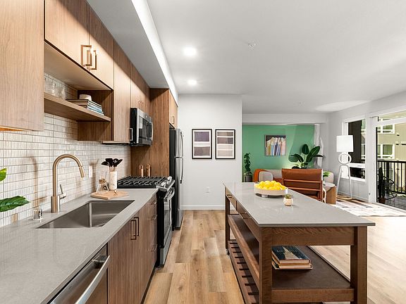 Stylish tile backsplash with quartz countertops