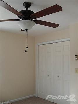 Master Bedroom on main floor. Freshly painted, new carpeting, double closet, paddle fan.
