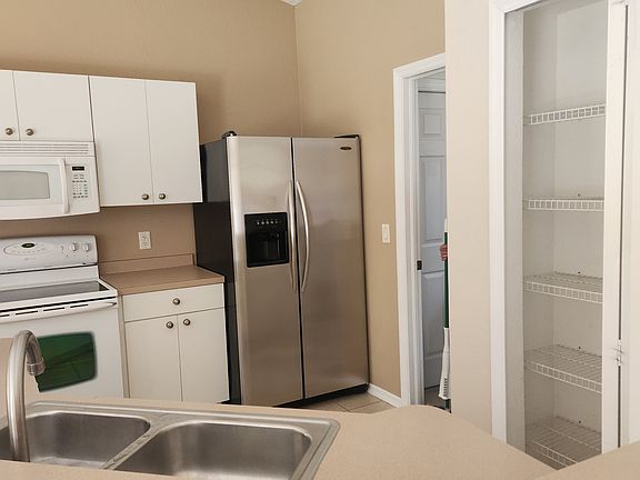 Open Kitchen with Sitting around Counter Area