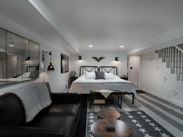 Lower level king size bed and couch
