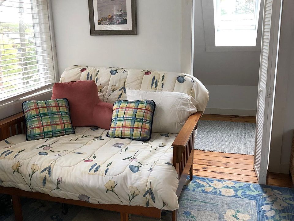 futon and walk in closet