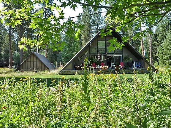 Wild flowers separate lawn f