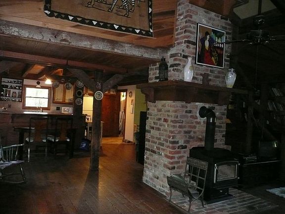 Floor to Ceiling Fireplace made of Reclaimed Brick from the Courthouse
