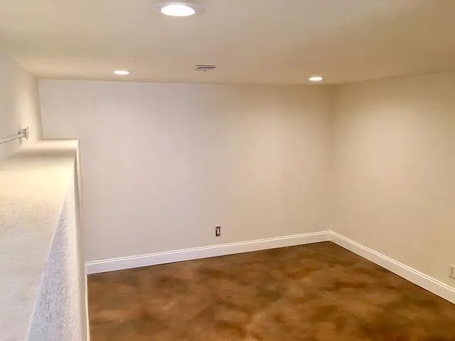 Bedroom 2/ LED lighting/ egress window. Now with wood look vinyl plank flooring not shown in pics.