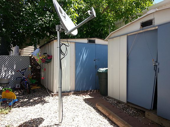 Two sheds in back yard