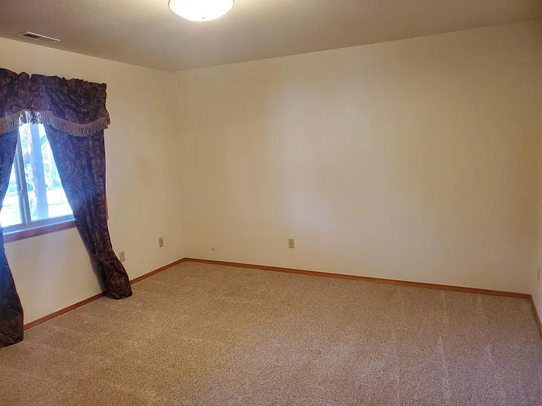 Downstairs bedroom #1. Also downstairs is 2nd bedroom and separate bathroom.