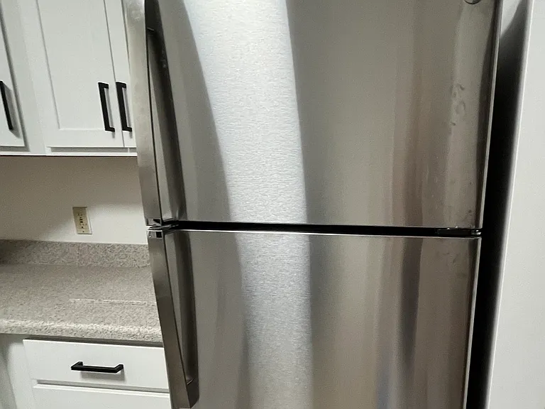 Brand new stainless steel refrigerator.
