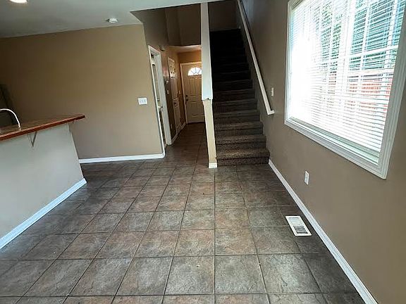 downstairs-dining, living room, kitchen laundry