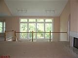 Greatroom looks into secluded yard.
