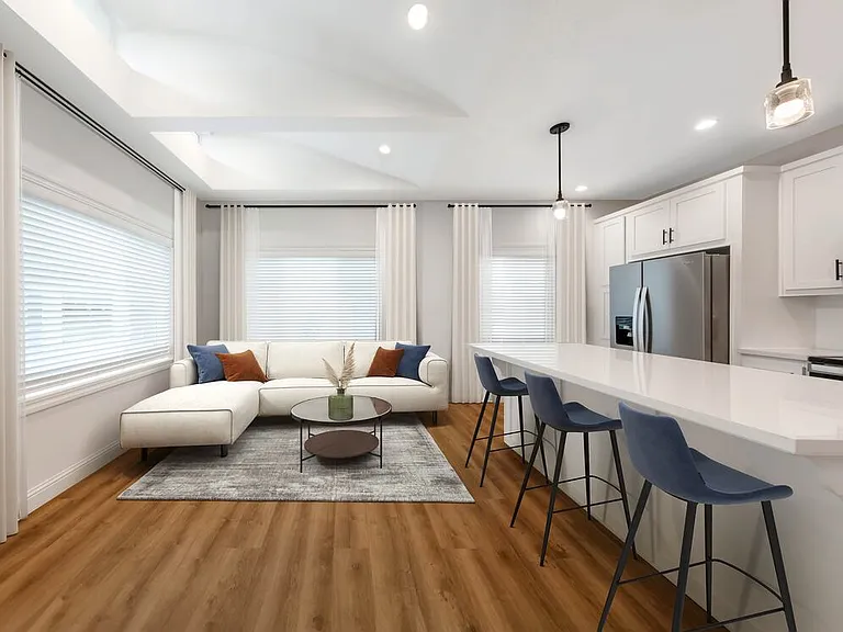 Freestanding Home kitchen and living room with hard surface flooring