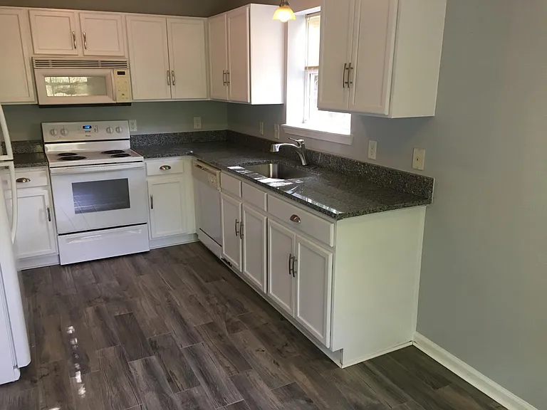 Newly painted cabinets with hardware