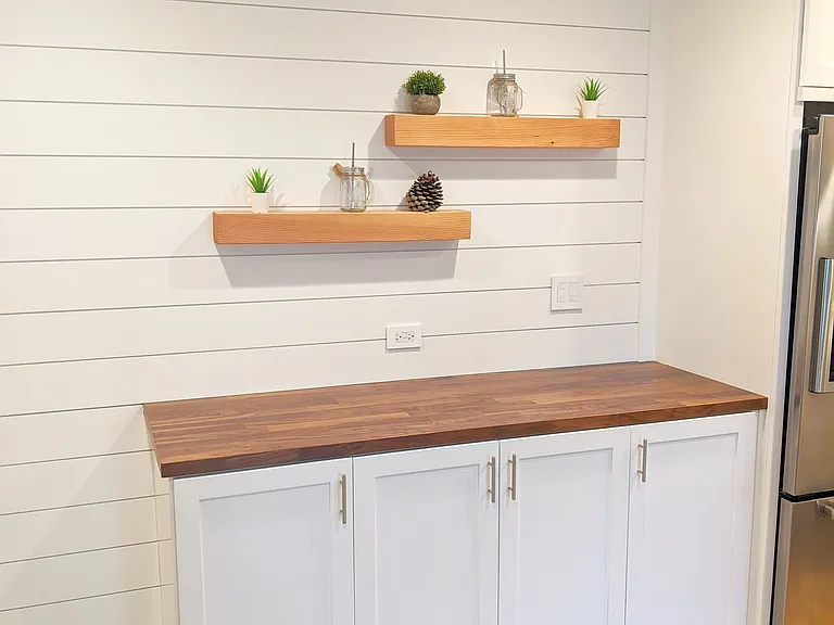 Coffee bar with custom accent wall and floating shelves