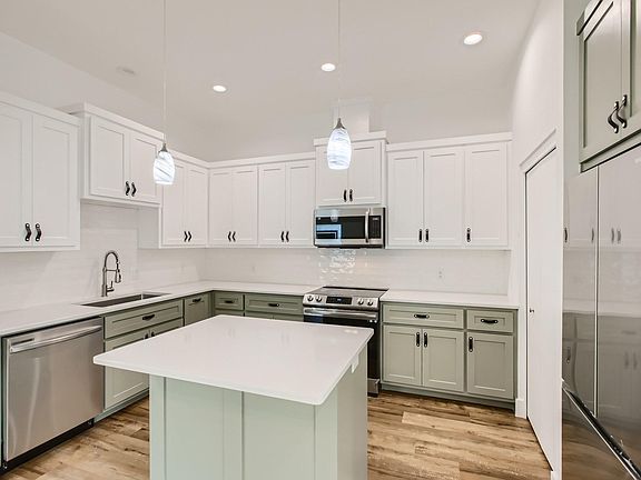 Spacious kitchen area. Fridge included.