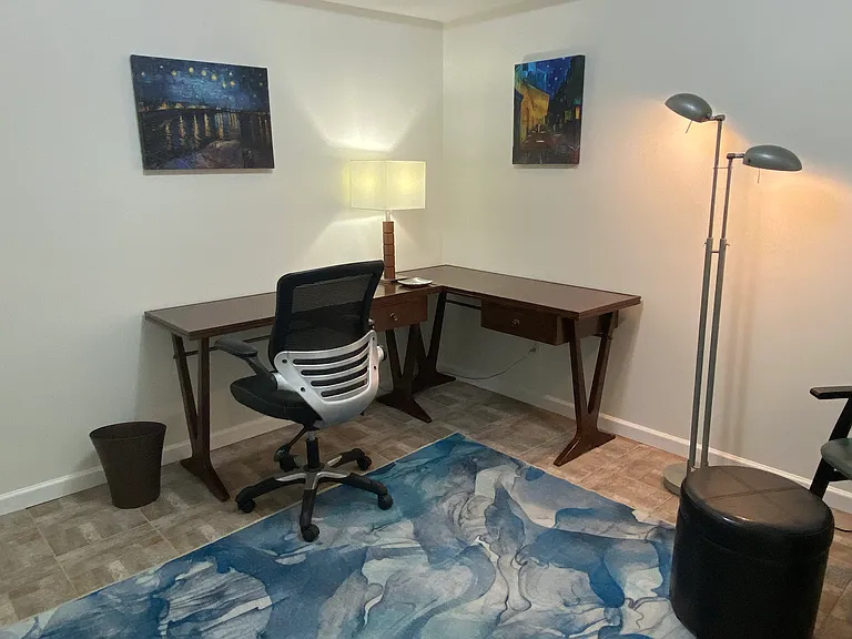 Bonus room, furnished as office, but also room for exercise, plus extra storage