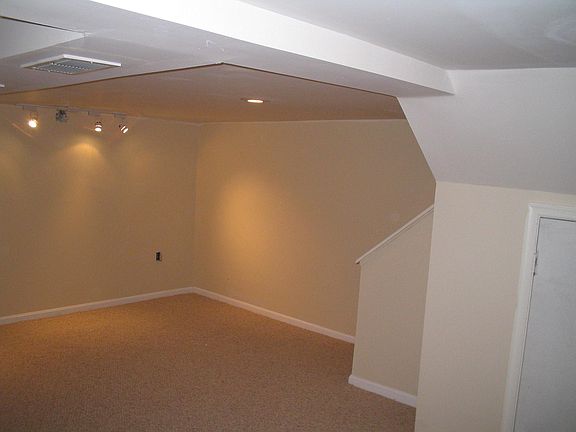 Corner for Bed with Track Lighting