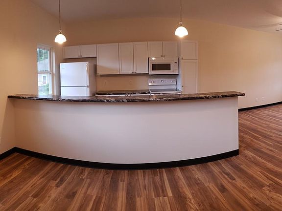 Panoramic view of upper level (kitchen, dining room, living room)