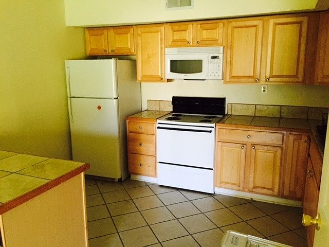 Spacious kitchen with large island and a lot of counter spac
