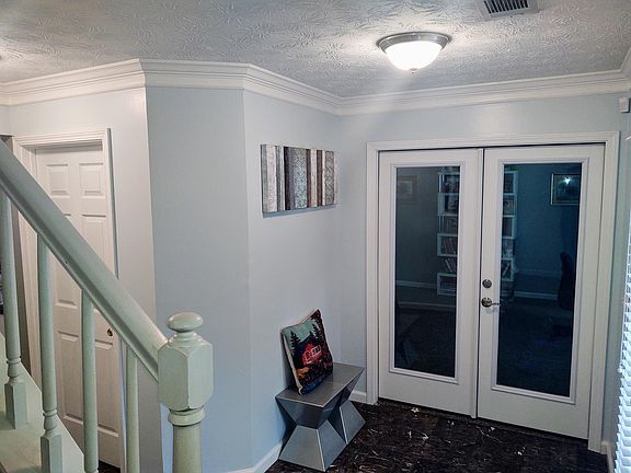 View of the foyer from the stairs.