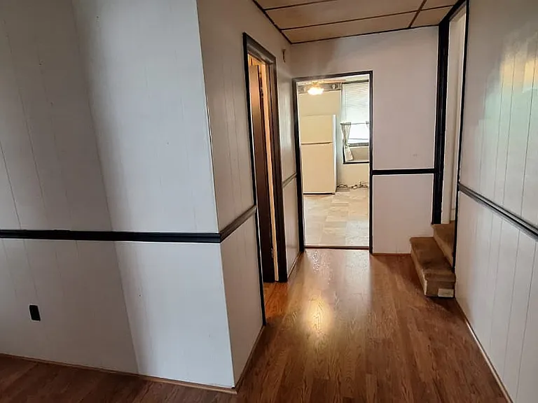 halfway from the living room to the rest of the house