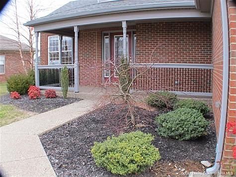 CHARMING COVERED FRONT PORCH.