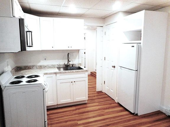 kitchen and bedroom doorway with sliding pocket door