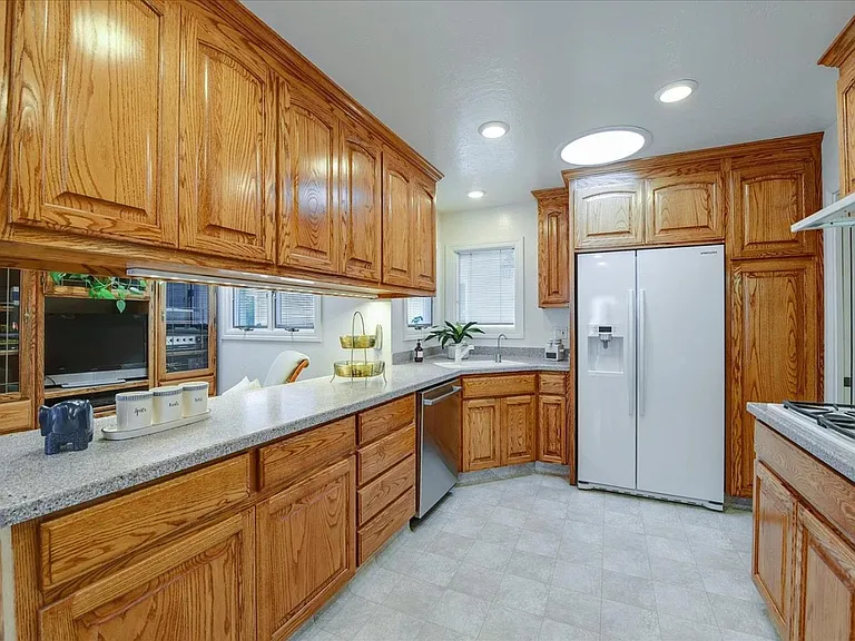 Fully equipped kitchen with spacious countertops, ample storage, modern appliances, and everything you need to cook and enjoy meals at home.