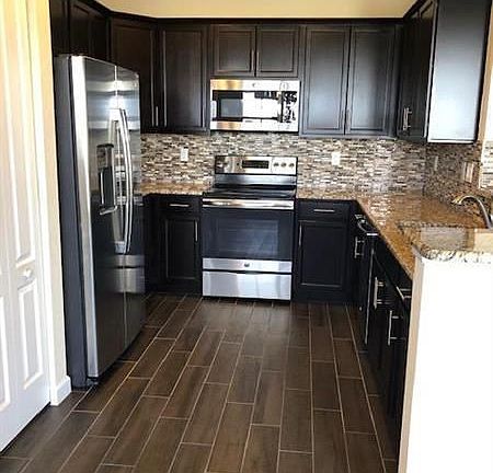 3rd image of 9575 Town Parc Cir N