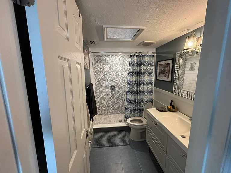 Master Suite bathroom with all tiled walk in shower
