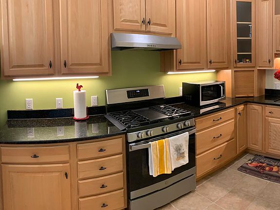 Granite countertops, great cabinets, breakfast bar.