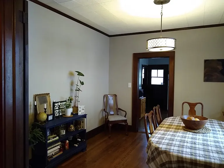 Dining room with door to kitchen