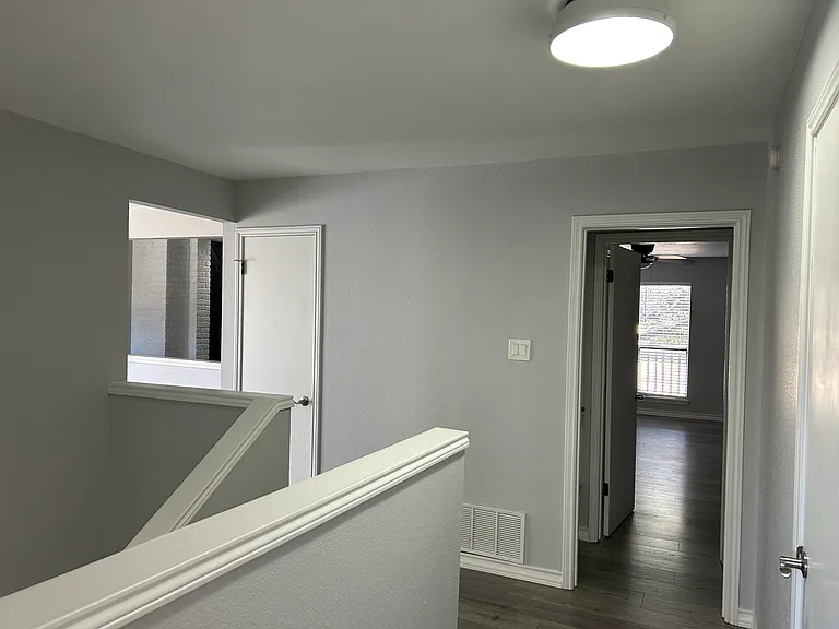 Closet 2 is the closed door next to the entry to the loft area.