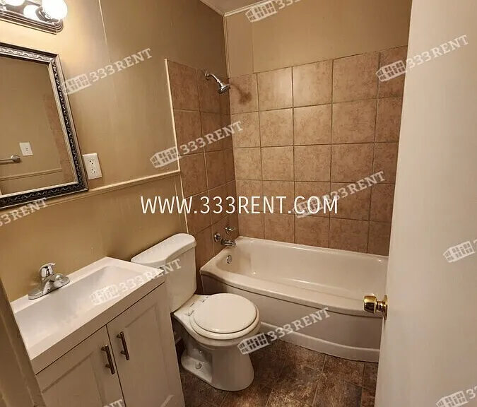 807 E 100th Ter — Photo 13