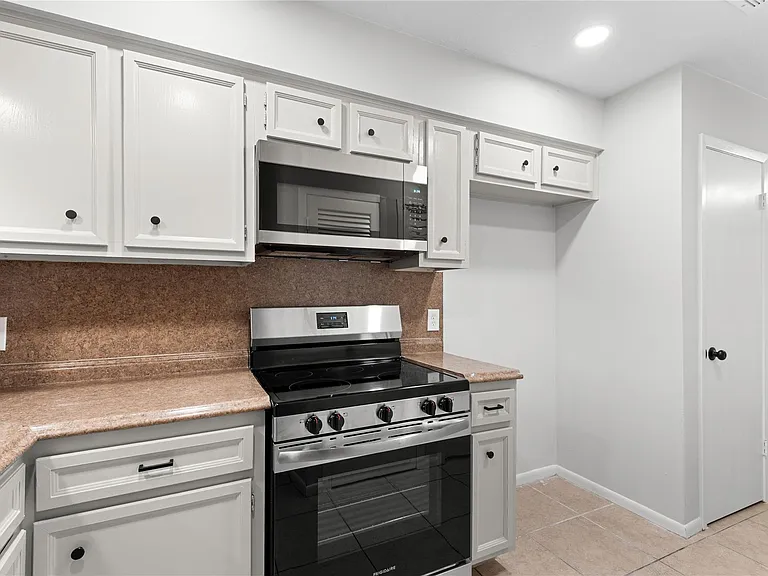 9306 Tooley Dr — Photo 10