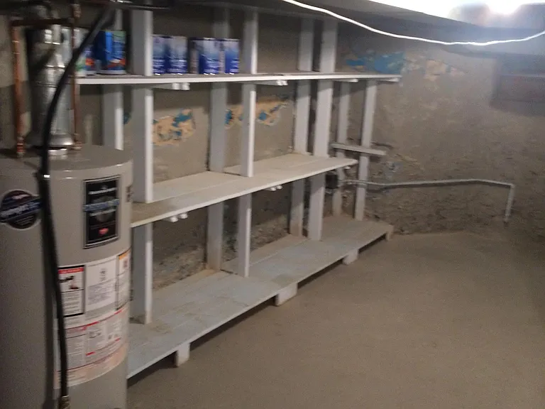 BASEMENT SHELVES WITH PLENTY OF STORAGE