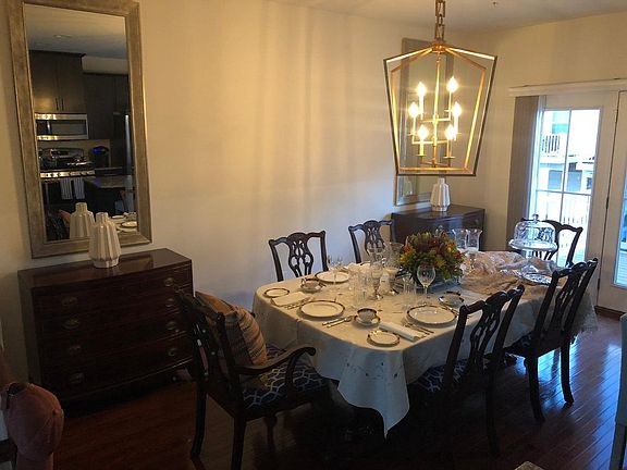 Spacious dining room accommodates 8 people
