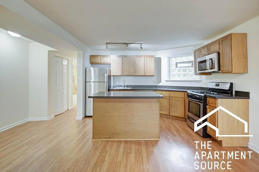 Spacious 3 Bed Condo in Chicago - 3045 W Logan - Available 10/1 - $2495/mo — Photo 1