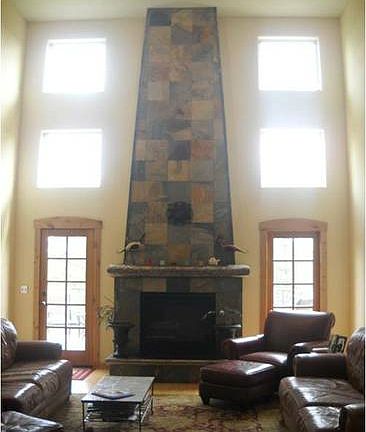 2 story slate gas fireplace