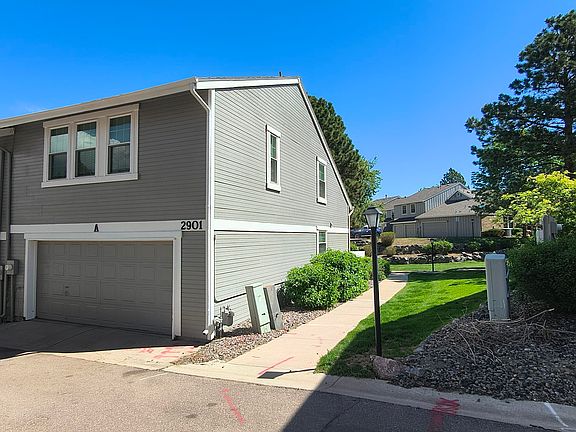 Back side of property, easy visitor parking down path on Long Dr