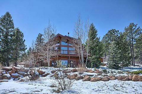 Custom log home on 1.77 acres