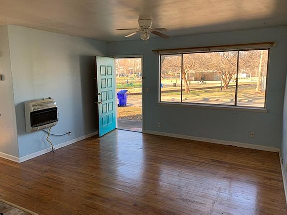 Living Room with Lions Park across street