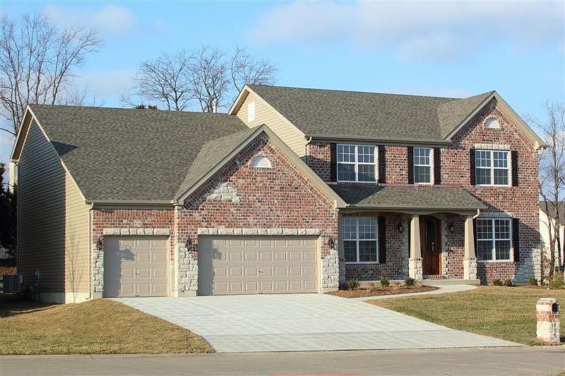 Full Brick & Stone Front, Copper Flashings, Architectural Roof Shingles