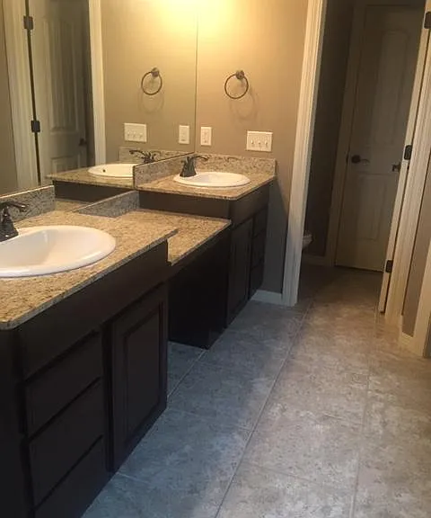 Master bath Jack and Jill with center vanity.