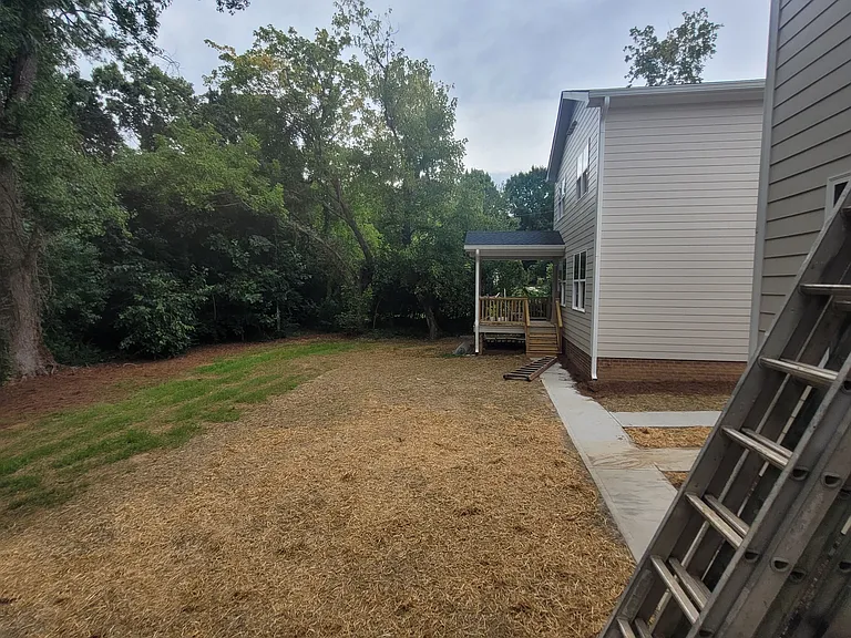 Backyard and porch off back of house
