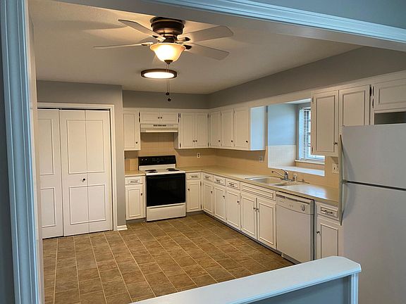 Newly painted cabinets in eat-in kitchen