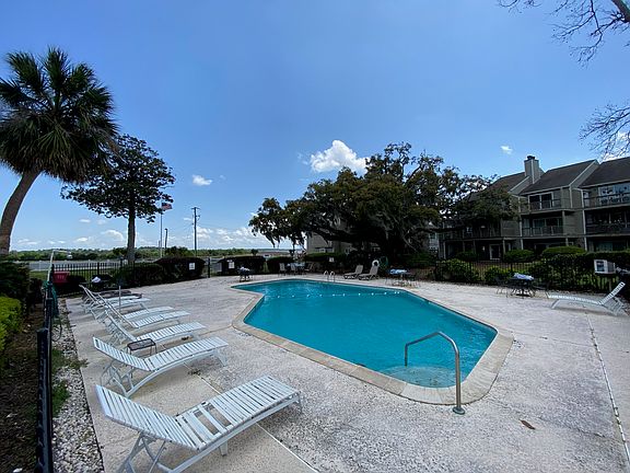 Access to community pool with views of river